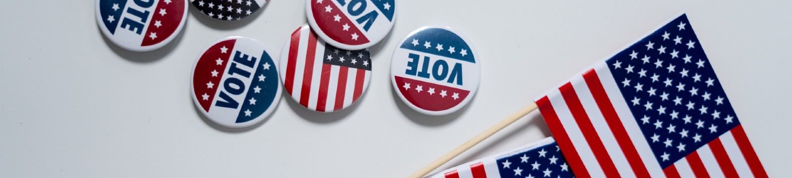 Stock image of American flag and vote buttons